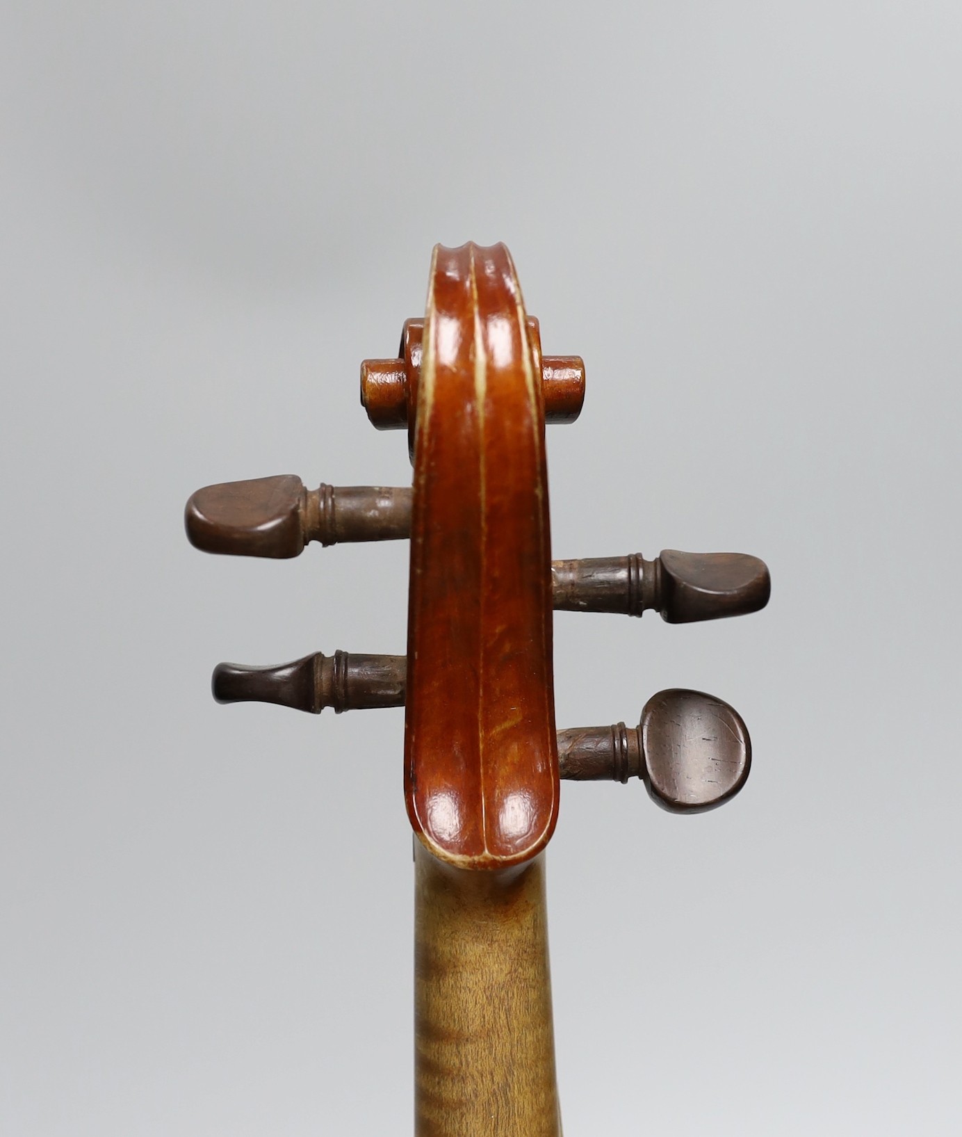 A cased 19th century French violin, back 34cm